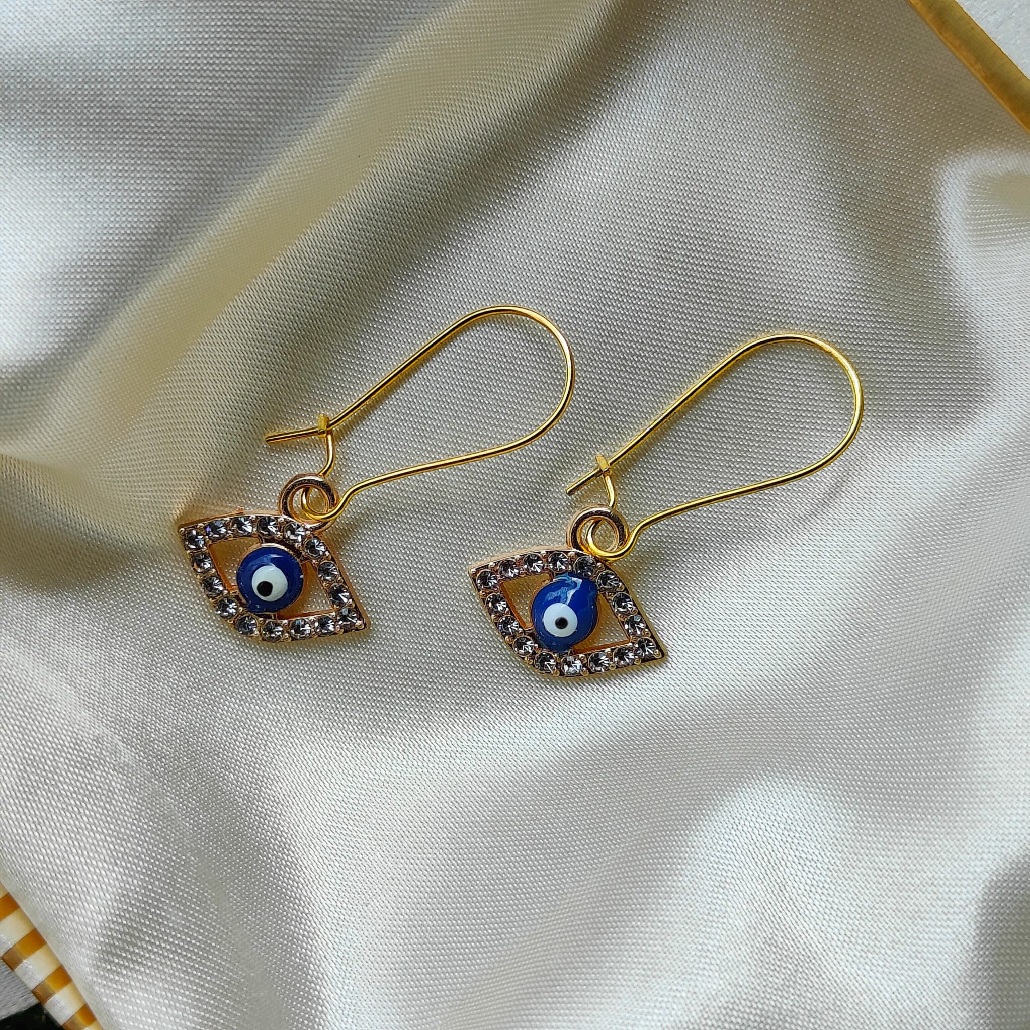 Silver eye sale earrings