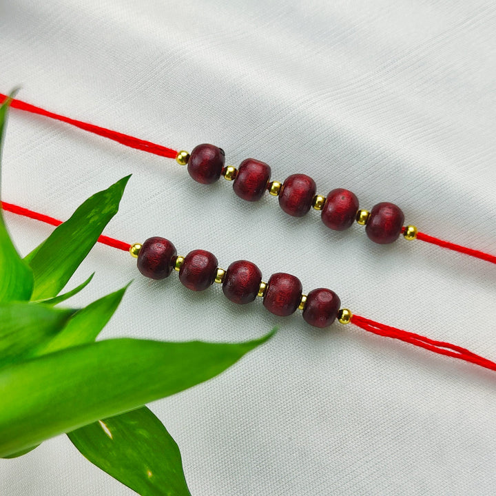 Plain Sandalwood Red Bead Hindu Festival Rakhi with Roli Chawal