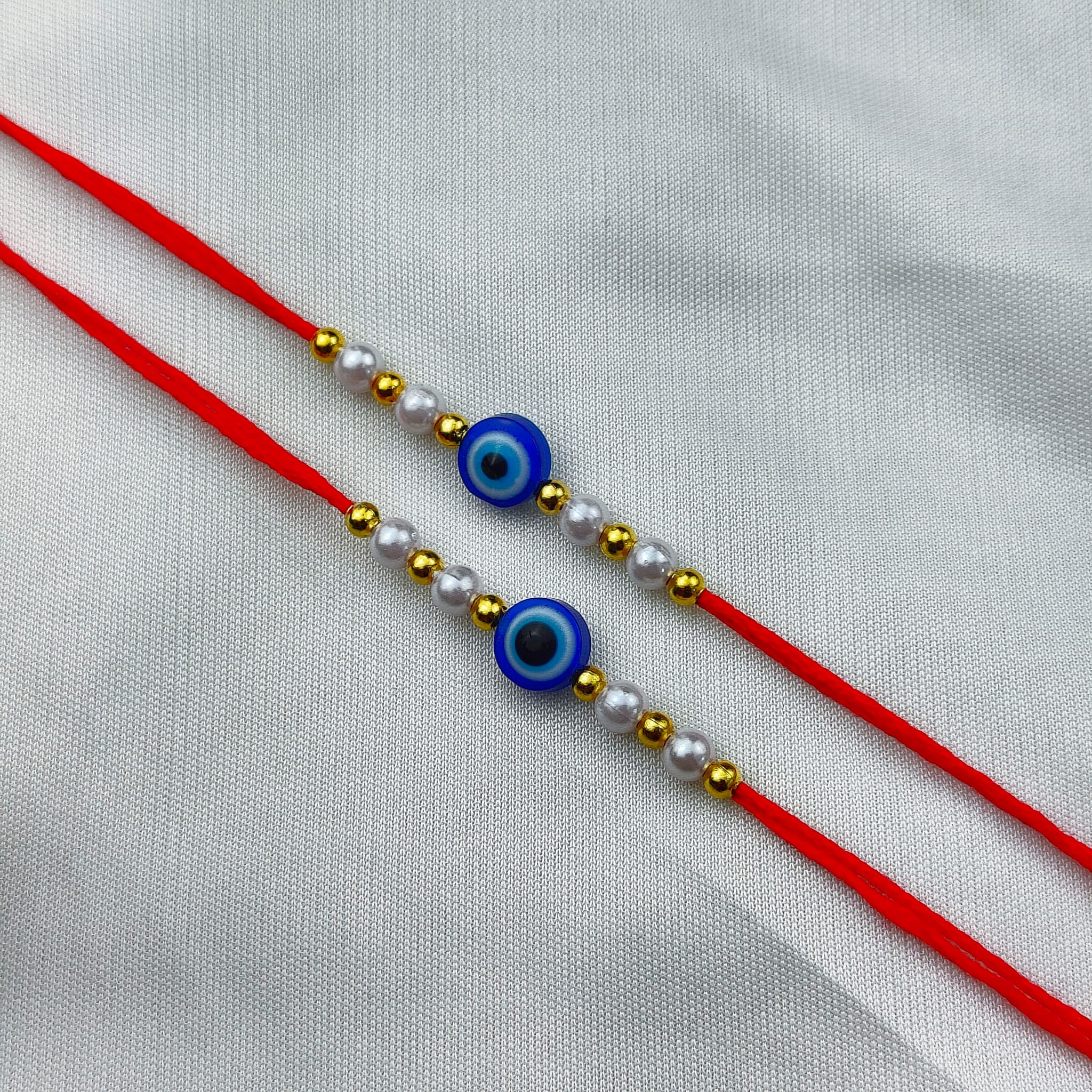 Evil Eye Bead White Pearl Rakhi for Raksha Bandhan | Personalised Rakhi for Brother