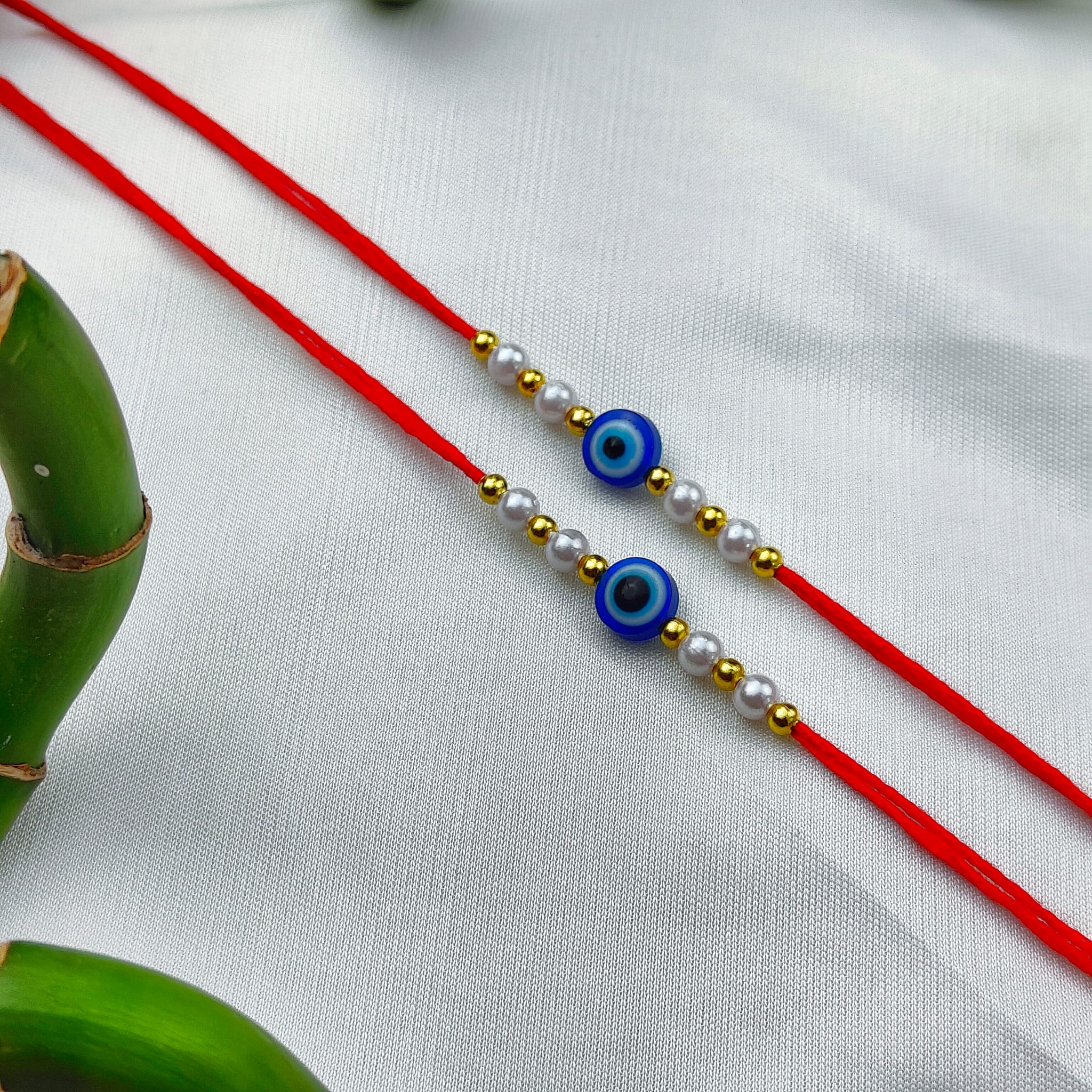 Evil Eye Bead White Pearl Rakhi for Raksha Bandhan | Personalised Rakhi for Brother