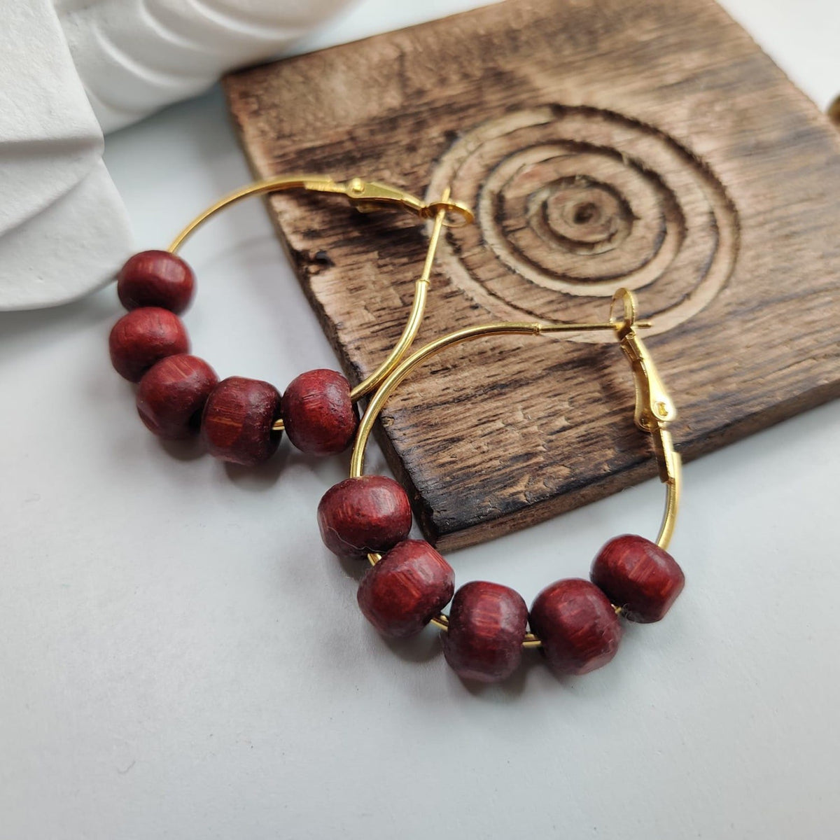 Red Sandalwood Beaded Huggie Dainty Hindu Asian Bali Boho Hoop Earring (Close-up Detail) | The Colourful Aura