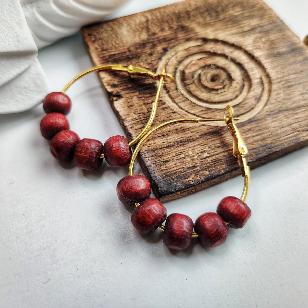 Red Sandalwood Beaded Huggie Dainty Hindu Asian Bali Boho Hoop Earring (Close-up Detail) | The Colourful Aura