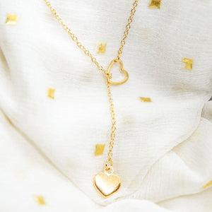 Two Heart Charm Cross Solid Heart Drop Interlock Y Shape Lariat Necklace (Close-up Detail) | The Colourful Aura