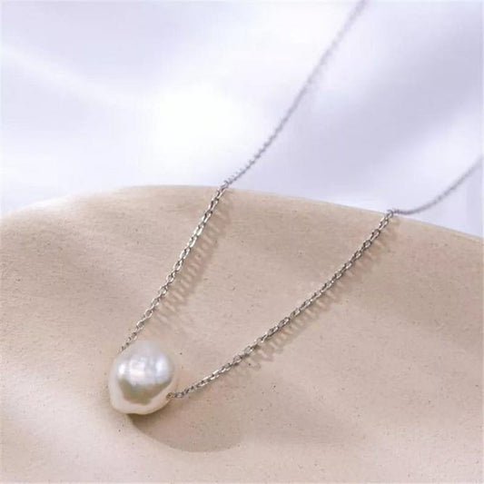 Gold single pearl necklace