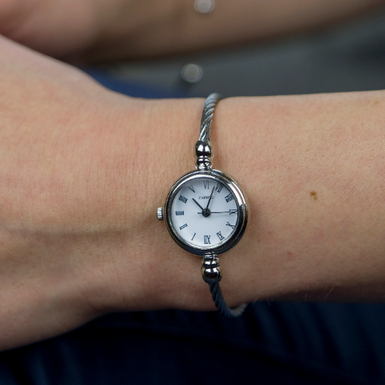 Silver Stainless Steel Roman White Dial Bangle Adjustable Bracelet Watch (Close-up Detail) | The Colourful Aura