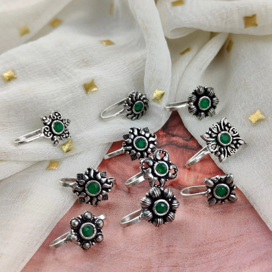 Green stone nose deals pin